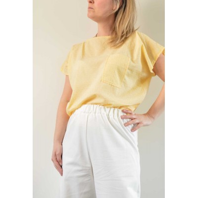 Blusa diritta con tasca •...